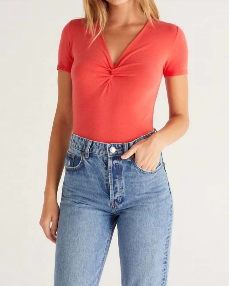 Front of a model wearing a size L Tabby Twist Top in Firecracker in Firecracker by Z Supply. | dia_product_style_image_id:346994